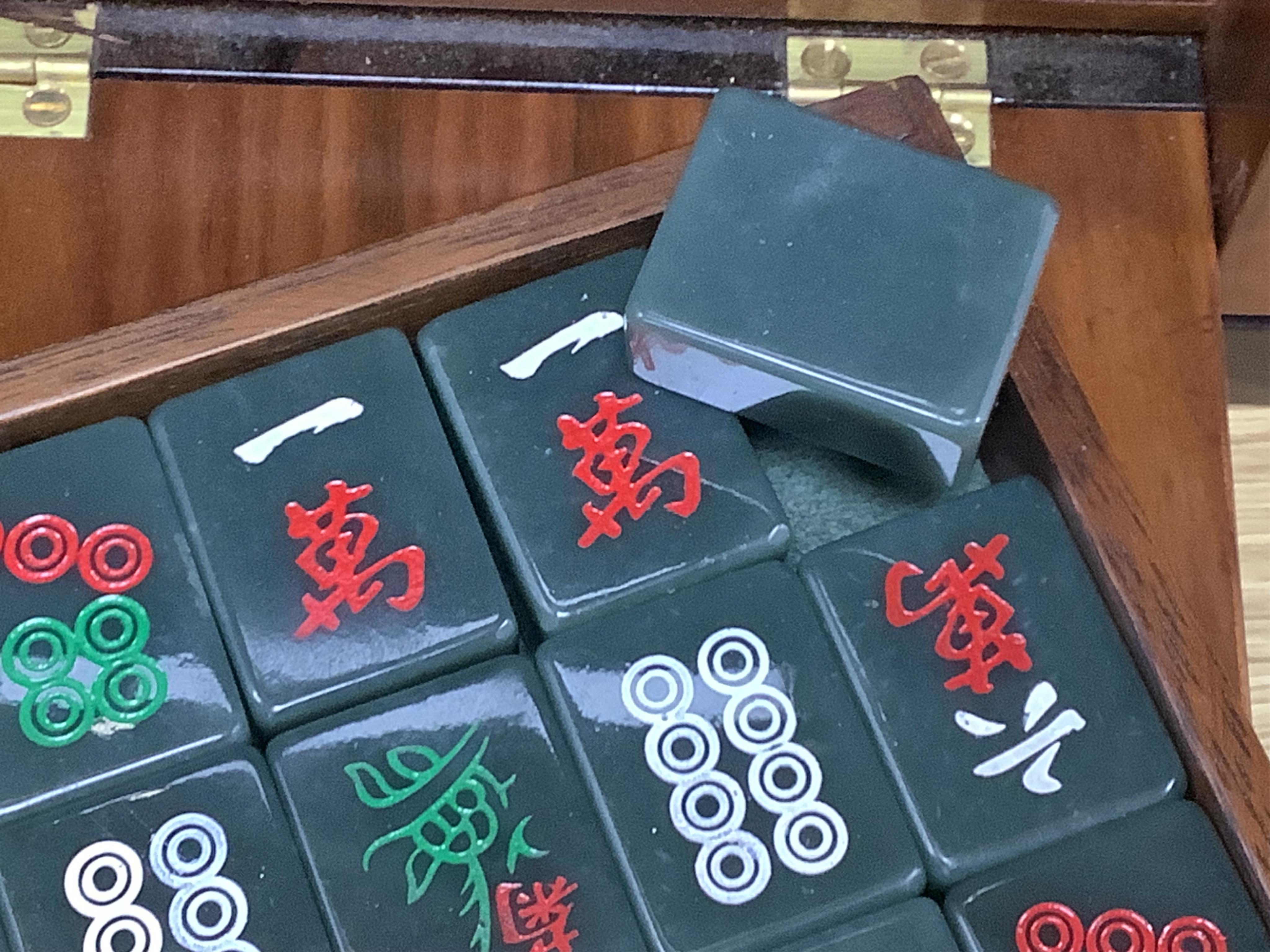 Two mahogany-cased hardstone mahjong sets, 22.5cm tall